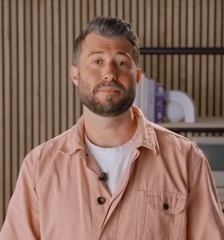 Paul working at his desk, focused on design and product development